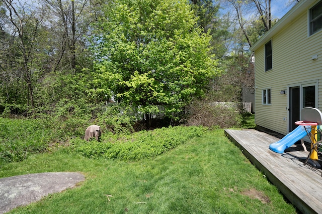 48 Pine Hill Dr Unit 48, Bath, ME 04530 - view of green lawn with a wooden deck