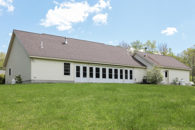 359 Beech Plains Rd, Buxton, ME 04093 - rear view of property featuring a shingled roof, a lawn, and central air condition unit