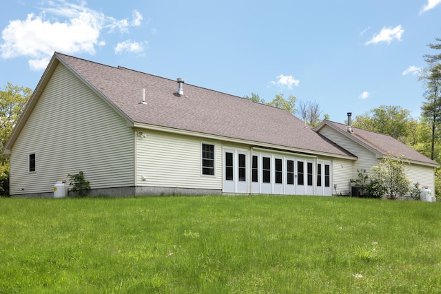359 Beech Plains Rd, Buxton, ME 04093 - rear view of house with a yard, a shingled roof, and central AC