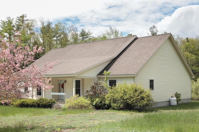 359 Beech Plains Rd, Buxton, ME 04093 - view of front of property with a shingled roof, covered porch, and a front yard