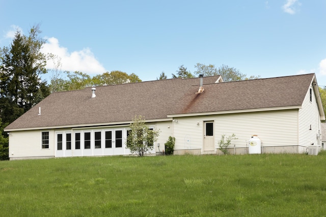 359 Beech Plains Rd, Buxton, ME 04093 - rear view of house featuring a lawn, roof with shingles, and central AC