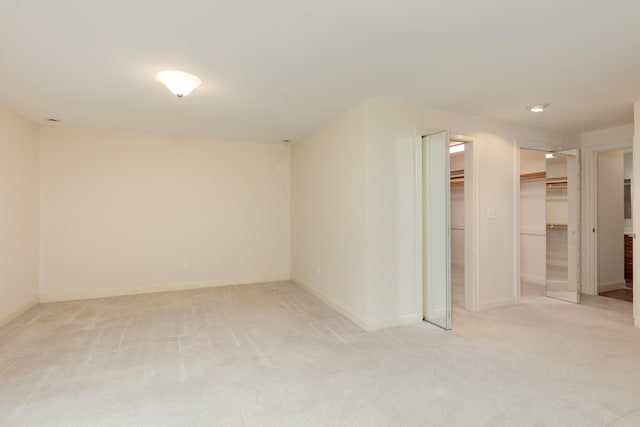 359 Beech Plains Rd, Buxton, ME 04093 - below grade area featuring light colored carpet and baseboards