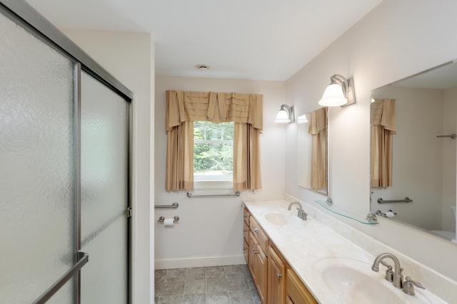 359 Beech Plains Rd, Buxton, ME 04093 - bathroom featuring baseboards, double vanity, and an enclosed shower