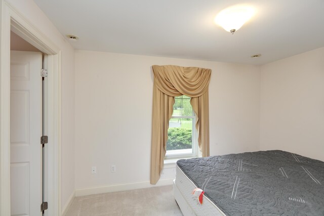 359 Beech Plains Rd, Buxton, ME 04093 - bedroom featuring light carpet and baseboards