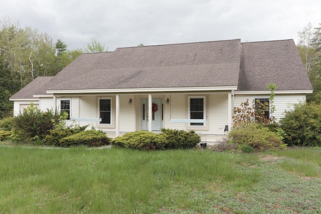 359 Beech Plains Rd, Buxton, ME 04093 - view of front facade with an attached garage, a porch, and roof with shingles