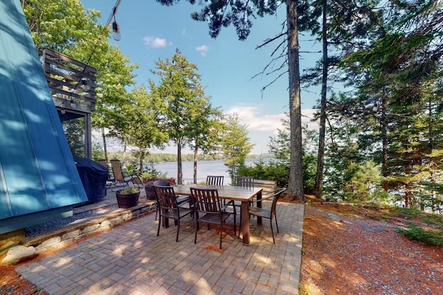 352 Georges Pond Rd, Franklin, ME 04634 - view of patio / terrace featuring outdoor dining space and a water view