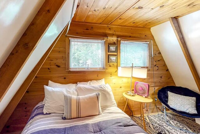 352 Georges Pond Rd, Franklin, ME 04634 - bedroom with wooden walls and wooden ceiling