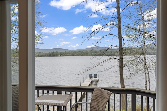 62 Lady Slipper Ln, Weld, ME 04285 - water view featuring mountains and a dock