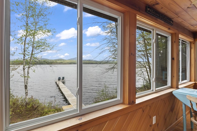 62 Lady Slipper Ln, Weld, ME 04285 - unfurnished sunroom with a water view