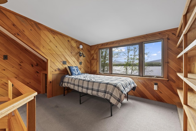 62 Lady Slipper Ln, Weld, ME 04285 - bedroom featuring carpet flooring, wood walls, and a water view