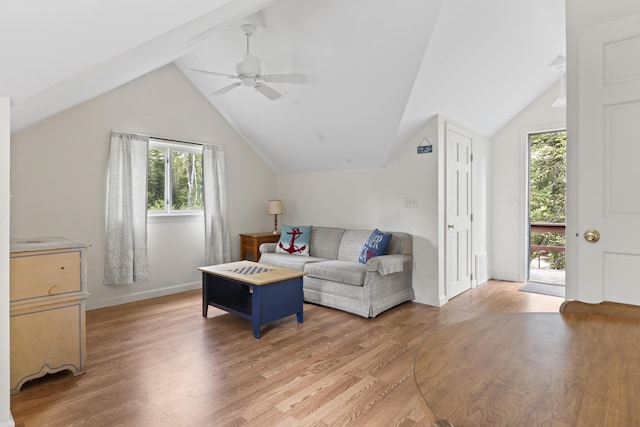 62 Lady Slipper Ln, Weld, ME 04285 - living room featuring lofted ceiling, light wood finished floors, a ceiling fan, and baseboards