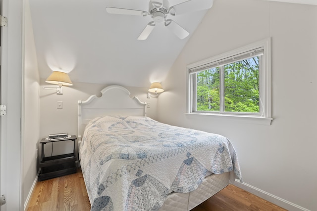 62 Lady Slipper Ln, Weld, ME 04285 - bedroom featuring lofted ceiling, wood finished floors, baseboards, and a ceiling fan