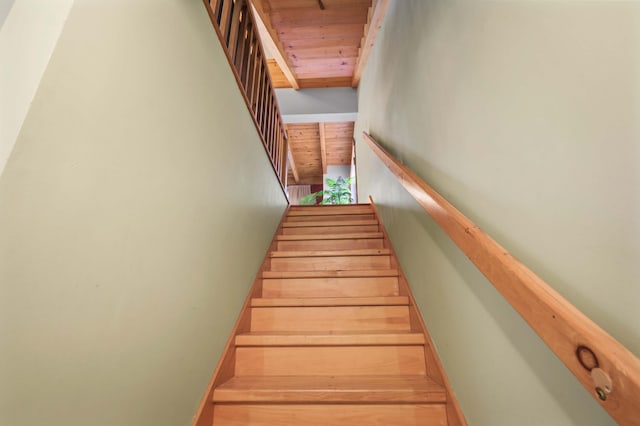 staircase featuring wood ceiling