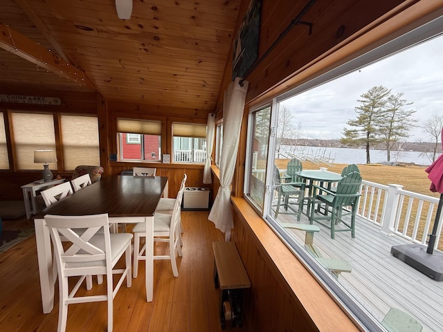 1270 Lakeview Dr Unit 21, China, ME 04358 - dining area with wood ceiling, wood-type flooring, and a water view