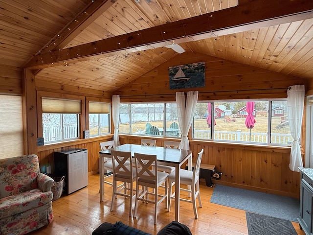 1270 Lakeview Dr Unit 21, China, ME 04358 - dining area with wooden walls, light wood-type flooring, and wood ceiling