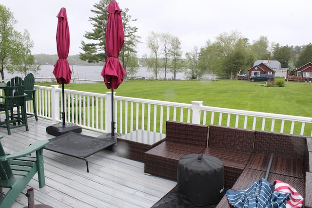 1270 Lakeview Dr Unit 21, China, ME 04358 - wooden deck featuring a water view and a lawn