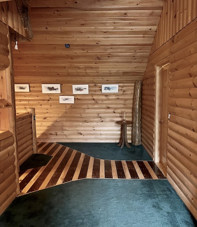 15 Miles Rd, Tremont, ME 04674 - relaxing sauna with rustic walls, carpet flooring, and wooden ceiling