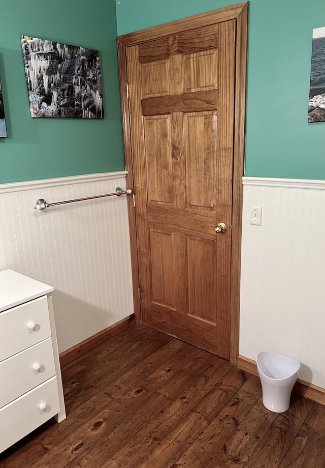 15 Miles Rd, Tremont, ME 04674 - bathroom with a wainscoted wall, hardwood / wood-style floors, and toilet