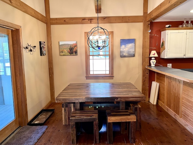 15 Miles Rd, Tremont, ME 04674 - dining area featuring dark wood-style flooring, plenty of natural light, and a chandelier