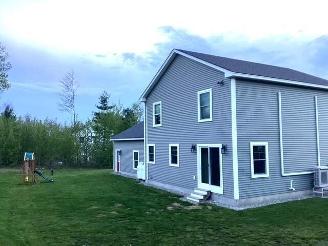 48 Mountain View Dr, Auburn, ME 04210 - rear view of house featuring entry steps and a yard