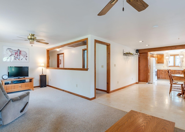 160 Rattlesnake Rd, Brownfield, ME 04010 - unfurnished living room with a ceiling fan and baseboards