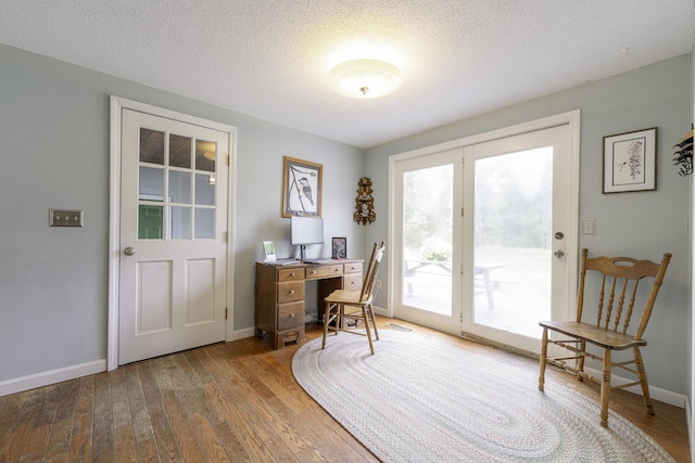 7 Salmon Run, Raymond, ME 04071 - office space featuring hardwood / wood-style floors, baseboards, and a textured ceiling