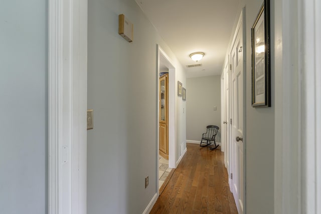 7 Salmon Run, Raymond, ME 04071 - hallway featuring wood finished floors and baseboards