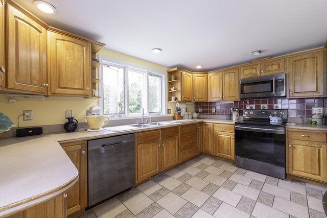 7 Salmon Run, Raymond, ME 04071 - kitchen featuring appliances with stainless steel finishes, a sink, open shelves, and light countertops