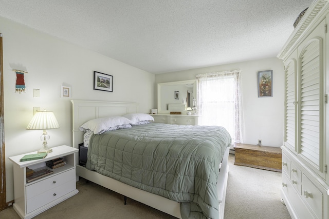 7 Salmon Run, Raymond, ME 04071 - carpeted bedroom featuring a textured ceiling