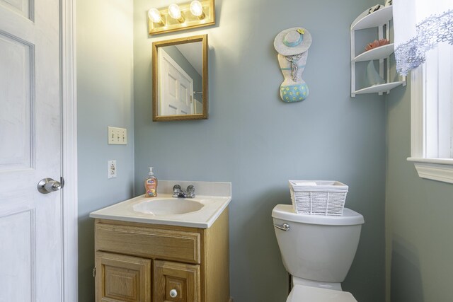 7 Salmon Run, Raymond, ME 04071 - bathroom featuring toilet and vanity