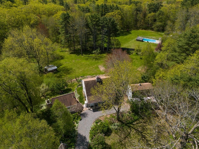 9 Juniper Ln, Damariscotta, ME 04543 - view of subject property featuring a pool and a heavily wooded area