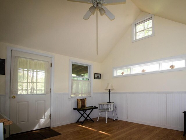 9 Juniper Ln, Damariscotta, ME 04543 - entrance foyer with wainscoting, wood finished floors, high vaulted ceiling, and ceiling fan