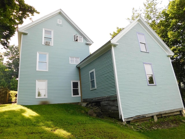 124 Church St, Dexter, ME 04930 - rear view of property with a yard and cooling unit
