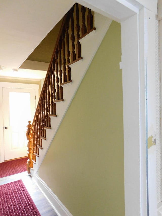 124 Church St, Dexter, ME 04930 - staircase featuring baseboards