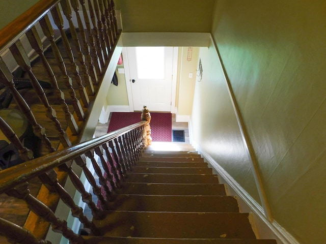124 Church St, Dexter, ME 04930 - stairway featuring baseboards