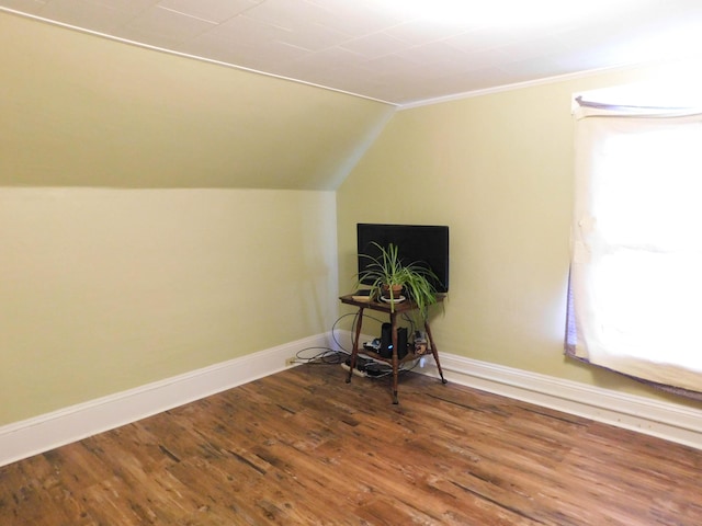 124 Church St, Dexter, ME 04930 - bonus room featuring baseboards, wood finished floors, and lofted ceiling