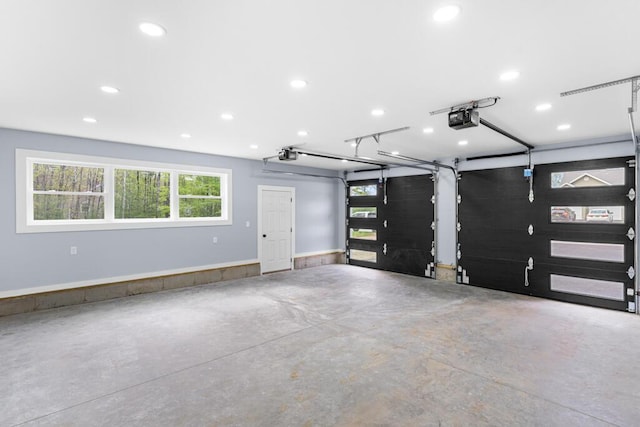 15 Stone Ledge Dr, Lewiston, ME 04240 - garage featuring a garage door opener and recessed lighting