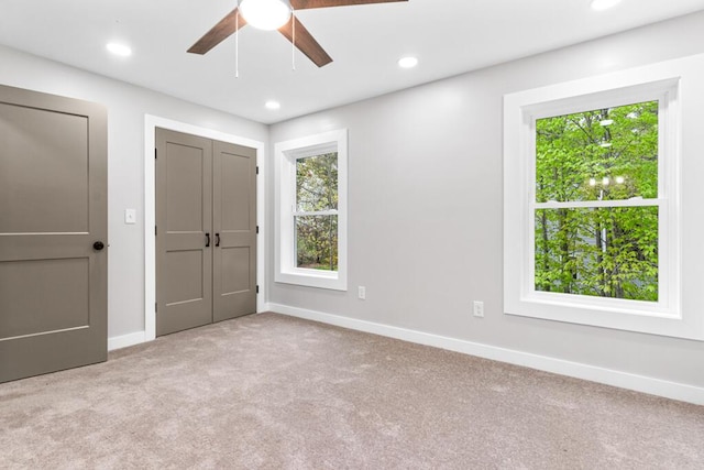 15 Stone Ledge Dr, Lewiston, ME 04240 - unfurnished bedroom with carpet floors, baseboards, recessed lighting, ceiling fan, and a closet