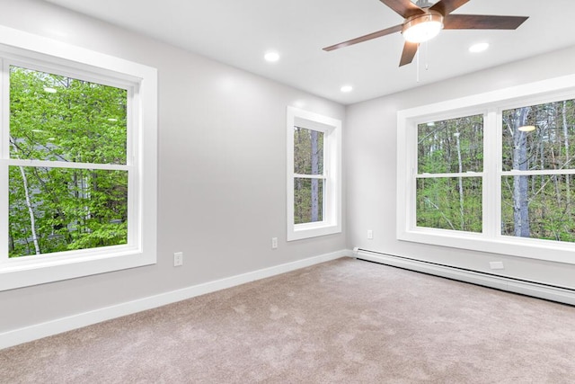 15 Stone Ledge Dr, Lewiston, ME 04240 - carpeted empty room featuring a baseboard radiator, plenty of natural light, baseboards, ceiling fan, and recessed lighting