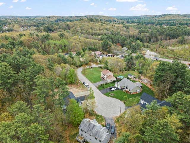 15 Stone Ledge Dr, Lewiston, ME 04240 - aerial view of property and surrounding area featuring a heavily wooded area