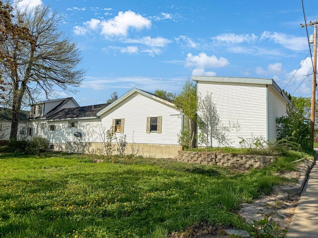 501 Knox St, Rumford, ME 04276 - view of home's exterior with a lawn