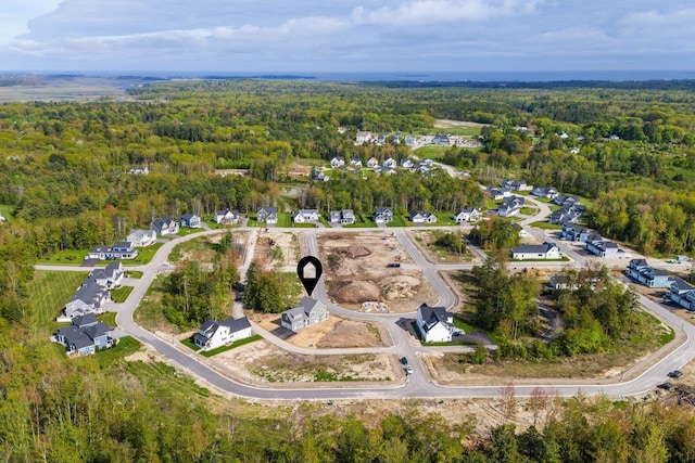 31 Emerson Way, Scarborough, ME 04074 - aerial view of property and surrounding area featuring a heavily wooded area and nearby suburban area