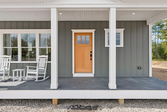 31 Emerson Way, Scarborough, ME 04074 - view of exterior entry with a porch and board and batten siding