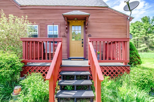 321 Clarks Bridge Rd, Waterboro, ME 04061 - doorway to property with roof with shingles and a deck