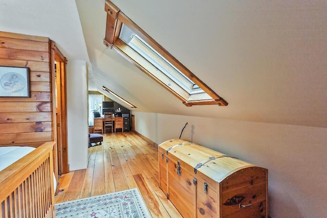 286 Canaan Rd, Clinton, ME 04927 - additional living space with a skylight, light wood-type flooring, and vaulted ceiling