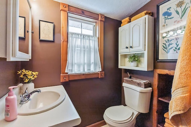 286 Canaan Rd, Clinton, ME 04927 - bathroom featuring toilet and vanity