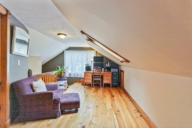 286 Canaan Rd, Clinton, ME 04927 - office area with wood-type flooring and lofted ceiling