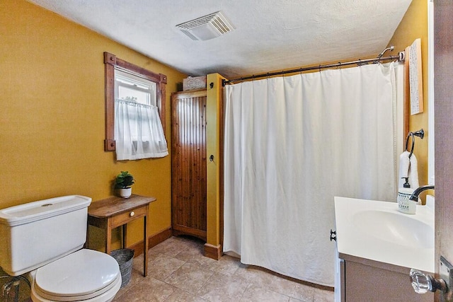 286 Canaan Rd, Clinton, ME 04927 - full bath with vanity, toilet, a shower with curtain, tile patterned flooring, and baseboards