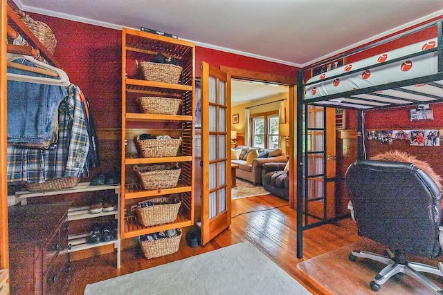 286 Canaan Rd, Clinton, ME 04927 - bedroom featuring french doors, wood finished floors, and ornamental molding
