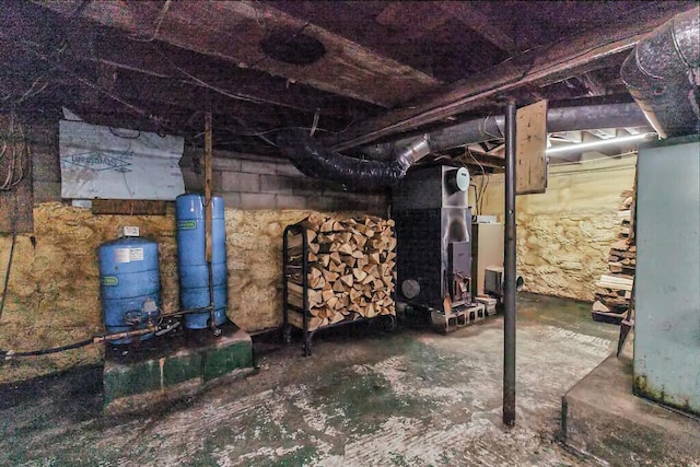 286 Canaan Rd, Clinton, ME 04927 - unfinished basement with a water pressure tank and heating unit